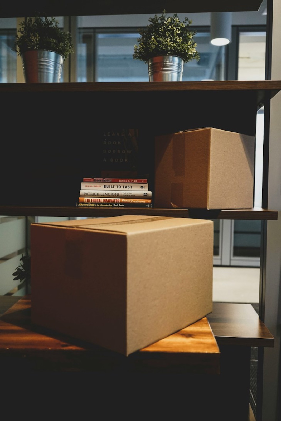 Packed boxes and books ready to move